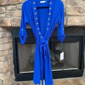 NWT Calvin Klein royal blue wrap dress. It IS a true wrap dress, hard to show.